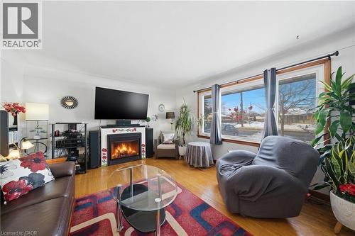 763 Upper Ottawa Street, Hamilton, ON - Indoor Photo Showing Living Room With Fireplace