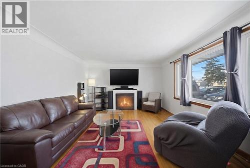 763 Upper Ottawa Street, Hamilton, ON - Indoor Photo Showing Living Room With Fireplace