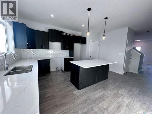 1123 Camden Gardens, White City, SK - Indoor Photo Showing Kitchen With Double Sink