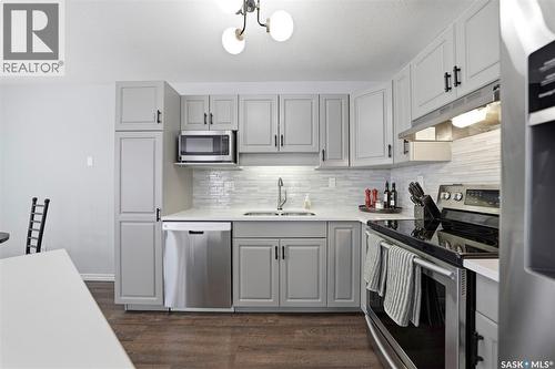 59 103 Banyan Crescent, Saskatoon, SK - Indoor Photo Showing Kitchen With Double Sink With Upgraded Kitchen