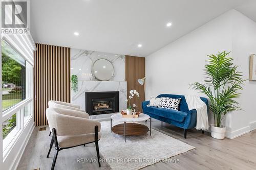 1035 Connery Avenue, Ottawa, ON - Indoor Photo Showing Living Room With Fireplace