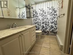Main level 3 piece bathroom. - 