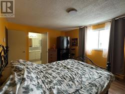 Primary bedroom with laundry. - 