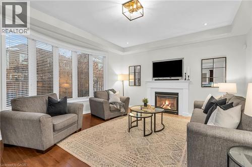 879 Etherington Way, Milton, ON - Indoor Photo Showing Living Room With Fireplace