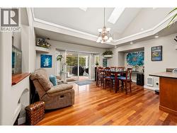 Open concept living room with high ceilings - 