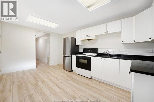785 Hall #Main, Windsor, ON - Indoor Photo Showing Kitchen With Double Sink