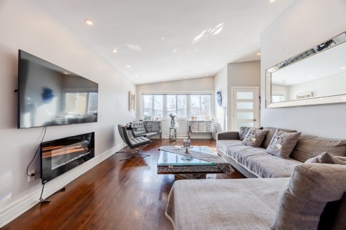 Living Room - 5741 Av. Blossom, Côte-Saint-Luc, QC - Indoor Photo Showing Living Room With Fireplace