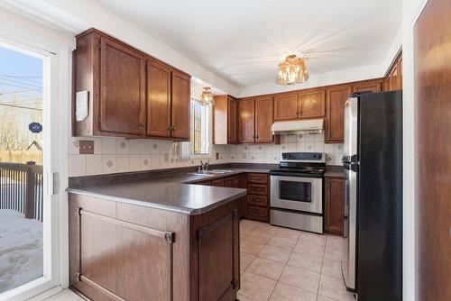 Cuisine - 124 Rue Stéphanie, Dollard-Des-Ormeaux, QC - Indoor Photo Showing Kitchen With Double Sink
