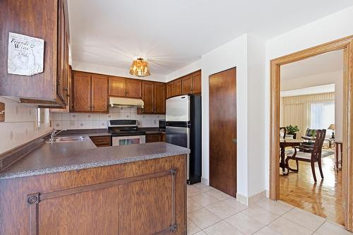 Cuisine - 124 Rue Stéphanie, Dollard-Des-Ormeaux, QC - Indoor Photo Showing Kitchen With Double Sink