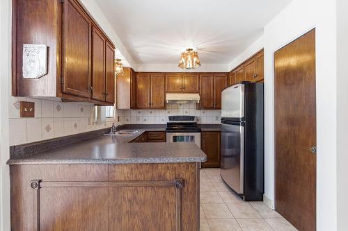 Cuisine - 124 Rue Stéphanie, Dollard-Des-Ormeaux, QC - Indoor Photo Showing Kitchen With Double Sink