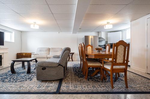 Intergenerational - 360 Rue Proteau, Saint-Eustache, QC - Indoor With Fireplace