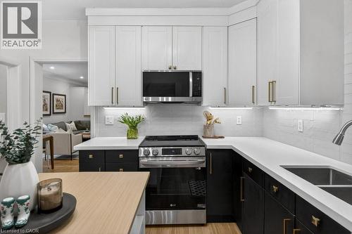 196 Paling Avenue, Hamilton, ON - Indoor Photo Showing Kitchen With Double Sink
