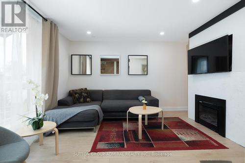 70 Belleville Street, Prince Edward County, ON - Indoor Photo Showing Living Room With Fireplace