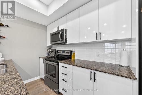 107 - 1206 Main Street E, Milton, ON - Indoor Photo Showing Kitchen With Upgraded Kitchen