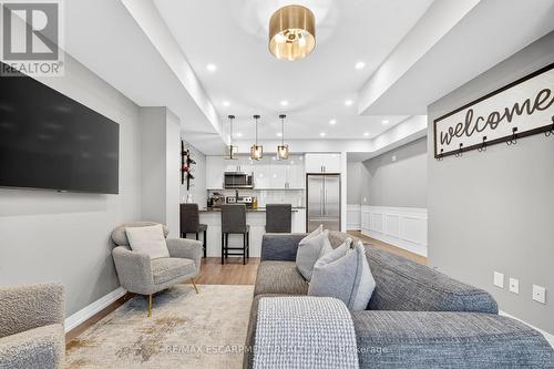 107 - 1206 Main Street E, Milton, ON - Indoor Photo Showing Living Room