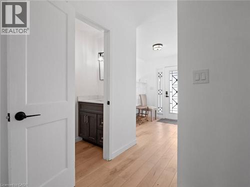 Hallway featuring baseboards and light wood-type flooring - 24 Keefer Road, Thorold, ON - Indoor Photo Showing Other Room