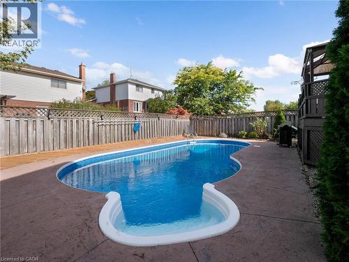 View of swimming pool with a fenced backyard, a fenced in pool, and a patio - 24 Keefer Road, Thorold, ON - Outdoor With In Ground Pool With Deck Patio Veranda With Backyard