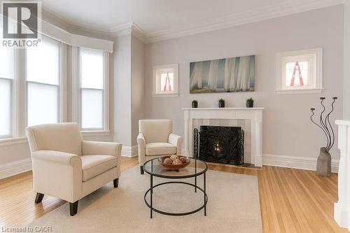 7 Homewood Avenue, Hamilton, ON - Indoor Photo Showing Living Room With Fireplace