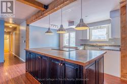 Bright open concept kitchen and dining room - 