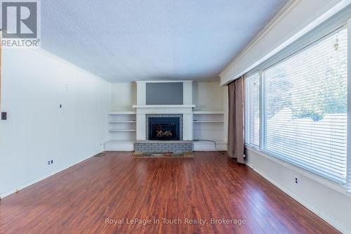 Living room - 440 Concession Rd 16 Concession E, Tiny, ON - Indoor Photo Showing Living Room With Fireplace