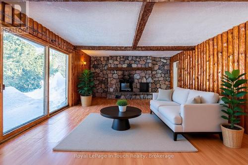 Virtually staged family room - 440 Concession Rd 16 Concession E, Tiny, ON - Indoor Photo Showing Living Room With Fireplace