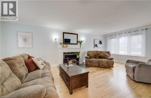 76 Brentwood Avenue, Kitchener, ON - Indoor Photo Showing Living Room With Fireplace