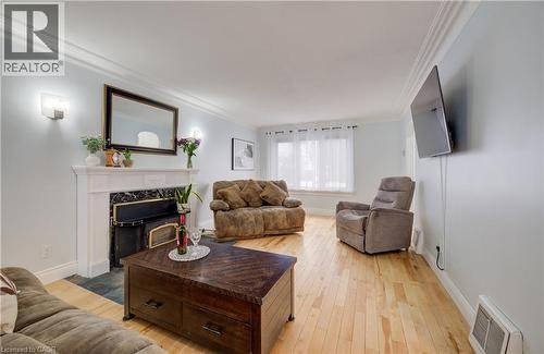 76 Brentwood Avenue, Kitchener, ON - Indoor Photo Showing Living Room With Fireplace