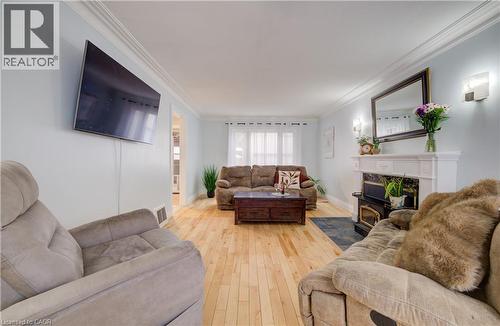 76 Brentwood Avenue, Kitchener, ON - Indoor Photo Showing Living Room With Fireplace