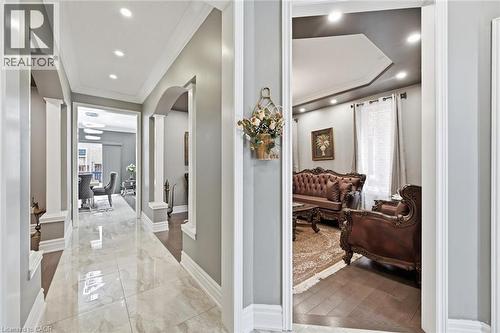 Corridor with arched walkways, ornamental molding, plenty of natural light, and recessed lighting - 456 Valridge Drive, Ancaster, ON - Indoor Photo Showing Other Room