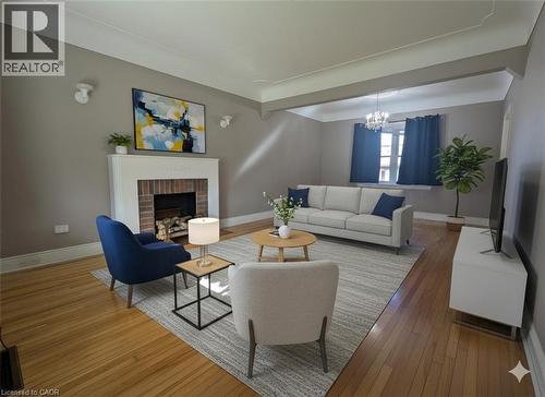 Living area - virtually staged - 59 Dunkirk Drive, Hamilton, ON - Indoor Photo Showing Living Room With Fireplace