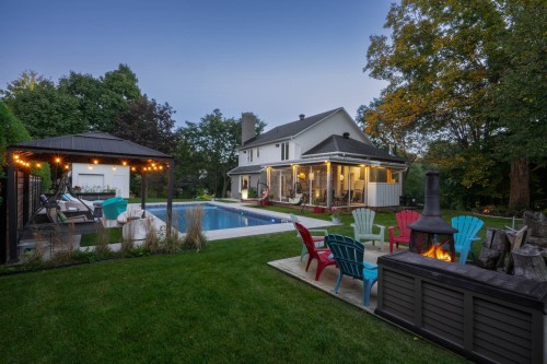 Extérieur - 25 Rue Carrier, Saint-Mathieu-De-Beloeil, QC - Outdoor With In Ground Pool With Deck Patio Veranda With Backyard