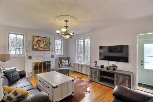 Salon - 808 1Re Avenue, Val-D'Or, QC - Indoor Photo Showing Living Room With Fireplace
