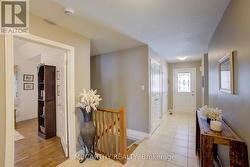 tile floor entry , woodend stairs to basement - 