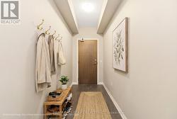 Virtually staged spacious foyer - 