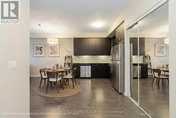 Virtually staged kitchen and dining area - 