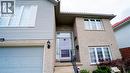 View of exterior entry with a garage - 44 Dunnigan Drive E, Kitchener, ON  - Outdoor 
