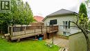 Rear view of property featuring a deck, a yard, and a patio area - 44 Dunnigan Drive E, Kitchener, ON  - Outdoor With Deck Patio Veranda With Exterior 