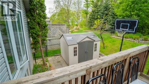Wooden terrace with a storage shed - 44 Dunnigan Drive E, Kitchener, ON - Outdoor With Deck Patio Veranda With Exterior
