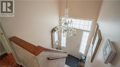 Foyer featuring a chandelier - 44 Dunnigan Drive E, Kitchener, ON - Indoor Photo Showing Other Room