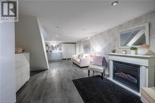 70 Berkley Crescent, Simcoe, ON - Indoor Photo Showing Living Room With Fireplace