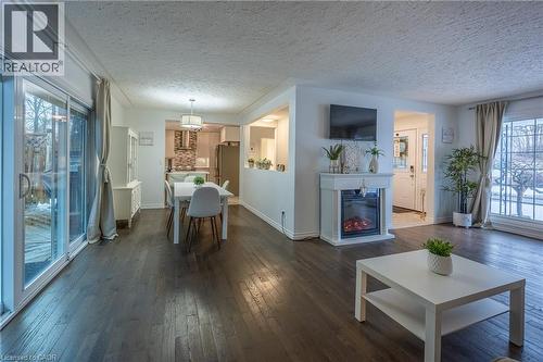 70 Berkley Crescent, Simcoe, ON - Indoor Photo Showing Living Room With Fireplace