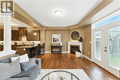 100 Fall Fair Way, Binbrook, ON - Indoor Photo Showing Living Room With Fireplace