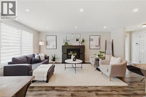 322 Sandowne Drive, Waterloo, ON - Indoor Photo Showing Living Room With Fireplace