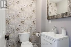 Main floor updated powder room - 