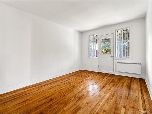 Salon - 6231 Rue Viau, Montréal (Rosemont/La Petite-Patrie), QC - Indoor Photo Showing Other Room