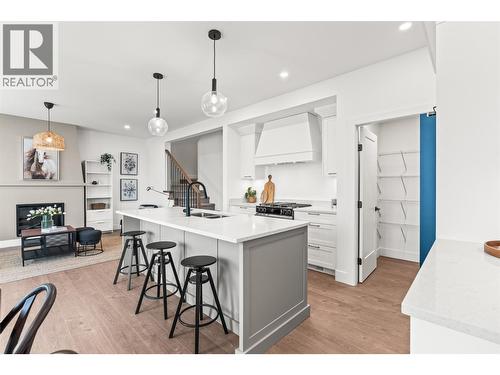 2455 Bradley Drive Unit# 102 Lot# 4, Armstrong, BC - Indoor Photo Showing Kitchen With Fireplace