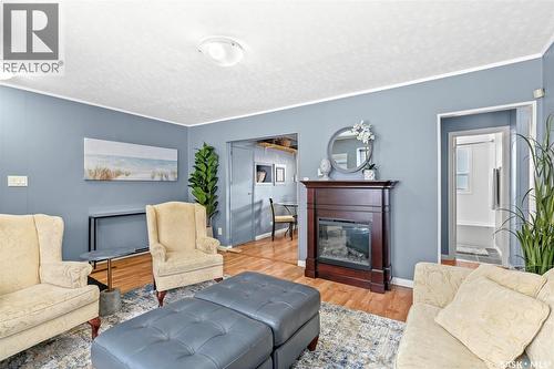 40 Sussex Crescent, Regina, SK - Indoor Photo Showing Living Room With Fireplace
