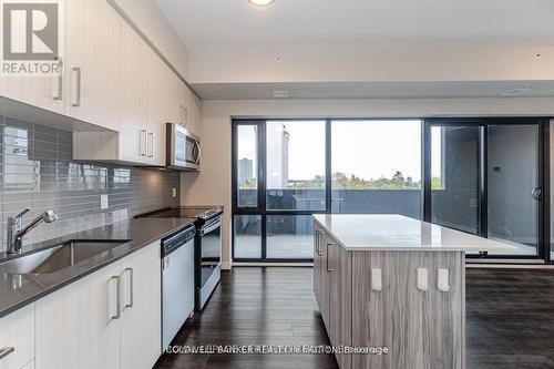 303 - 15 Queen Street S, Hamilton, ON - Indoor Photo Showing Kitchen With Stainless Steel Kitchen With Upgraded Kitchen