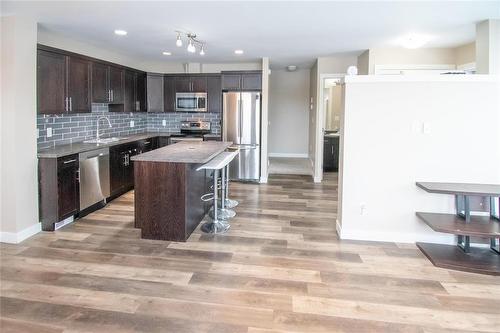 1 419 Pandora Avenue, Winnipeg, MB - Indoor Photo Showing Kitchen With Upgraded Kitchen
