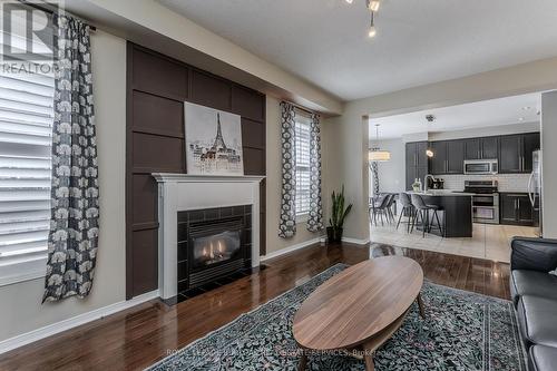2170 Jardine Crescent, Burlington, ON - Indoor Photo Showing Living Room With Fireplace